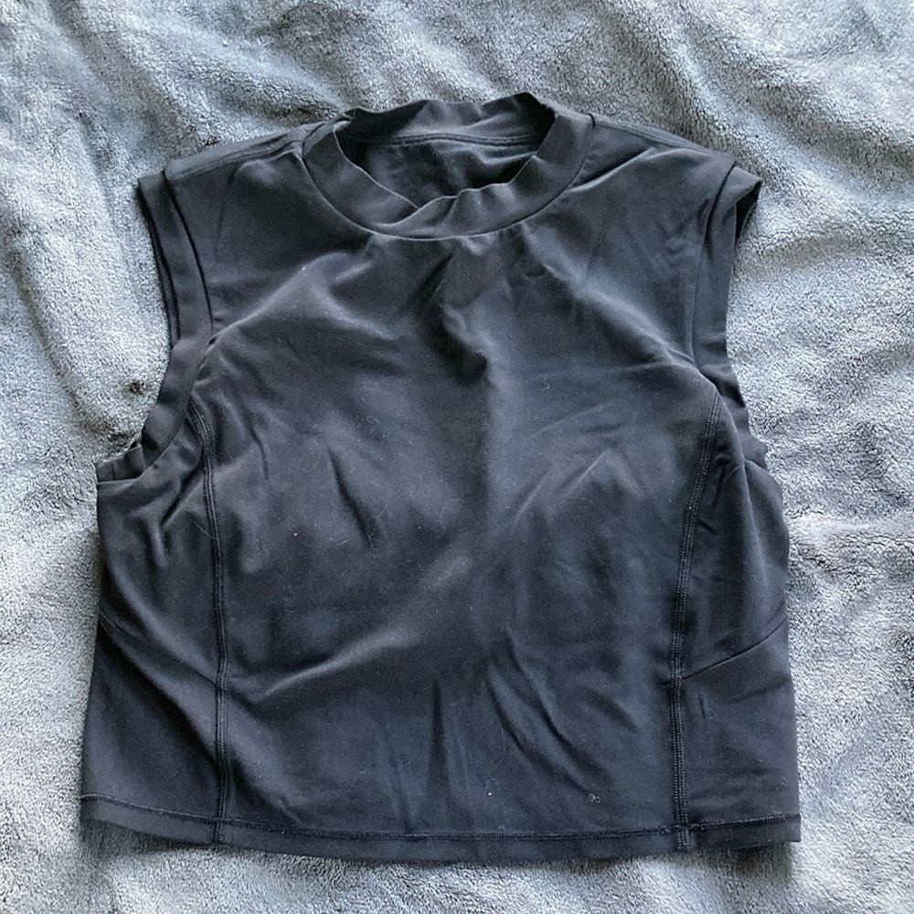 Lululemon black high neck tank top with cut out in back. Gently worn